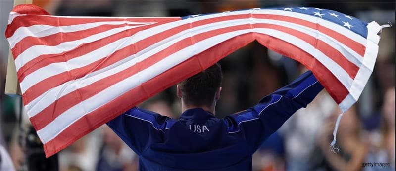 Team USA athlete celebrates with the American flag