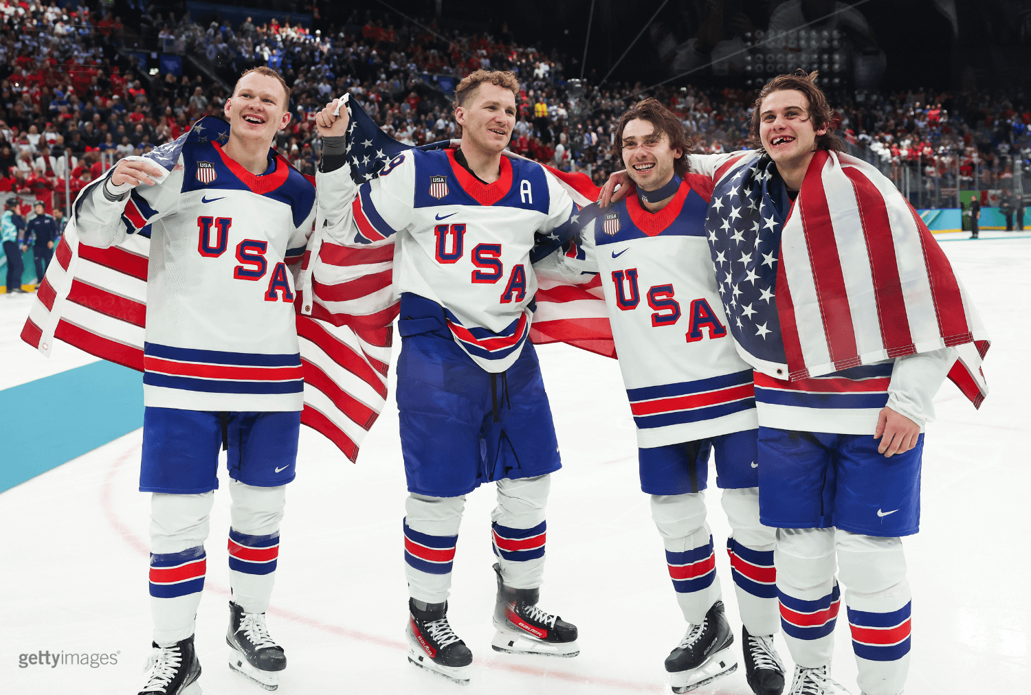 Team USA paralympic team celebrates gold.